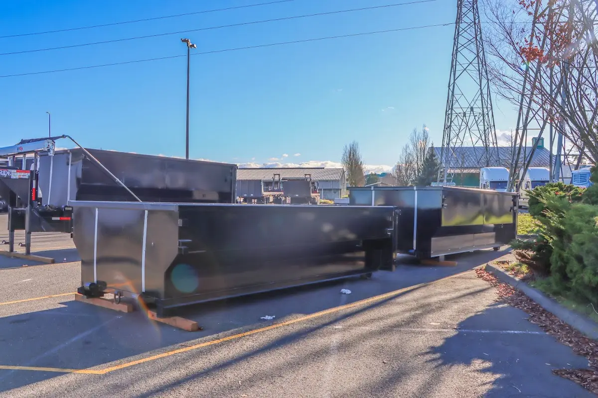Roll-off dumpster ready for waste disposal at job site for Concrete Dumpster Rental in West Bloomfield